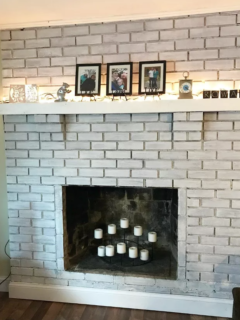 whitewashed brick fireplace after picture