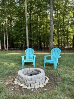 backyard fire pit with chairs